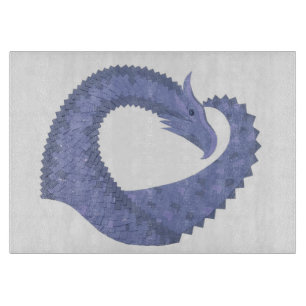 Blue-grey heart dragon on white cutting board