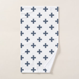 Blue-grey polka crosses on white hand towel