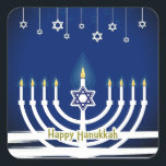 Blue Happy Hanukkah Star Menorah Candle Lights Square Sticker<br><div class="desc">Celebrate the Festival of Lights in style with these lovely Happy Hanukkah stickers. This festive design features a white candlelit menorah on a blue background with Happy Hanukkah written at the bottom in gold. Small decorative Magen David or Star of David hang from the top of the design. Great for...</div>