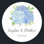 Blue Hydrangea Watercolor Floral Wedding Classic Round Sticker<br><div class="desc">These wedding stickers feature blue hydrangeas and leaves. Personalise them with your names and wedding date. These stickers are ideal for use as envelope seal stickers or for decorating wedding favours. These stickers are part of a collection which includes a range of matching wedding stationery. Please visit the collection page...</div>