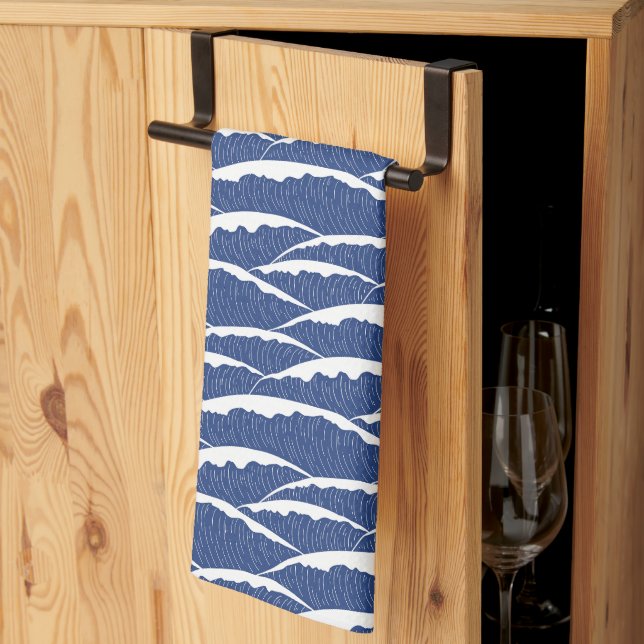 Blue kitchen towel with illustrative waves pattern (Thirds Fold)
