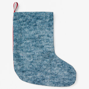 Blue knitting wool texture closeup photo backgroun small christmas stocking