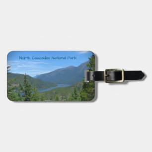 Blue Lake Winds Through Green Forested Mountains Luggage Tag