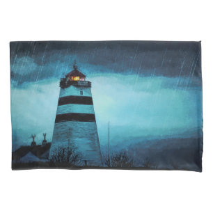 Blue lighthouse tower at night in pouring rain pillowcase