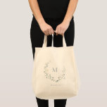 Blue Monogram Boho Wildflower Wreath Bridesmaid Tote Bag<br><div class="desc">Monogrammed initial framed by elegant delicate watercolor wildflower design, Pastel palettes of soft yellow, off white, sage green, dusty blue, and botanical greenery, with personalised name, simple and romantic. Great monogrammed gift for bridesmaid at modern rustic party, boho country garden wedding party in spring and summer. See all the matching...</div>