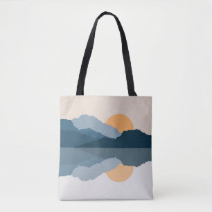 Blue mountains reflected in the lake tote bag