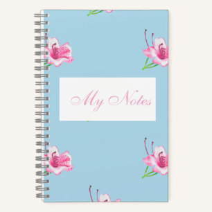 Blue mug with pink Lilly's Notebook