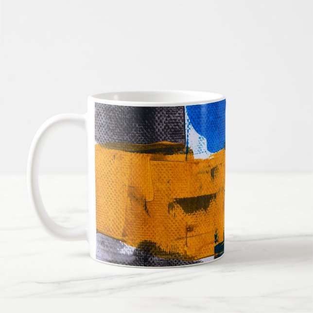 Blue, orange, and gray abstract art coffee mug (Left)