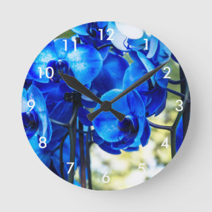 Blue orchids round clock