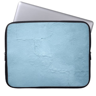 Blue painted concrete wall during daytime laptop sleeve