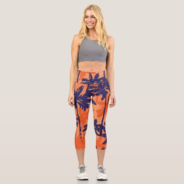 Blue palm silhouette, orange background capri leggings (Front)