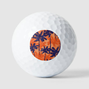 Blue palm silhouette, orange background golf balls
