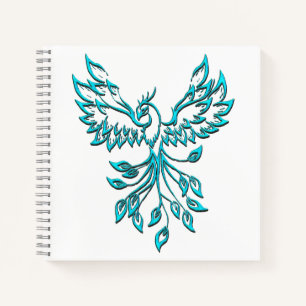 Blue Phoenix Rises on White Notebook