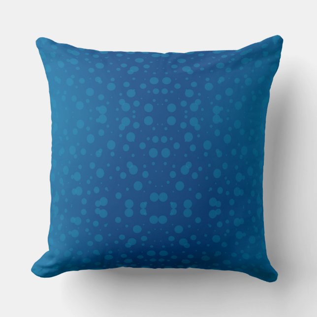 Blue pillow with a pattern of turquoise circles (Front)