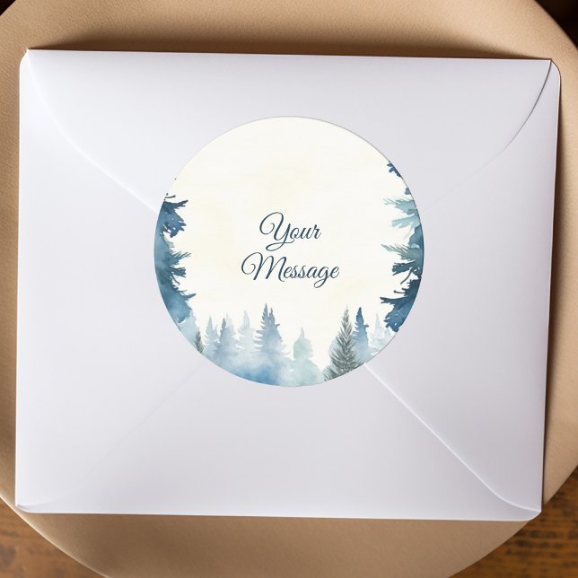 Blue pine trees your message holiday  classic round sticker (Round sticker with pine trees and your own message in an elegant script. Used as an envelope seal.)