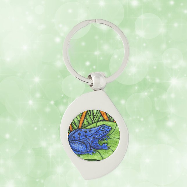 Blue Poison Vibrant Frog Key Ring (Blue poison Frog on green lily pad with yellow reeds grass on keychain.)