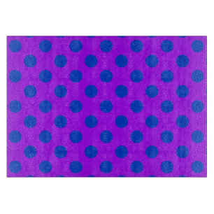 Blue polka dots on purple cutting board