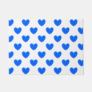 Blue polka hearts on white doormat