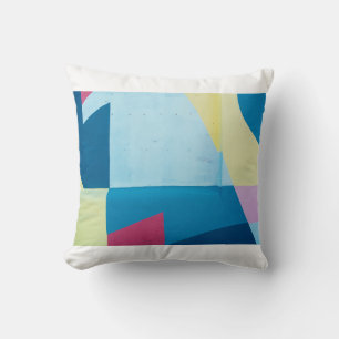 Blue, red, pink, and yellow abstract painting cushion