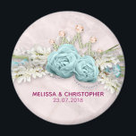 Blue Roses and Crown Floral Bouquet Wedding Magnet<br><div class="desc">A wedding magnet designed with a photo of blue roses surrounded by sprigs and leaves and fancy baubles. The baubles also form a crown shape. White flowers and pretty blue bows and white lacy ribbon also surround the roses. Set on a dusty pink marble background.</div>