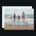 Blue Seas and Greetings  Beach Christmas Holiday Card<br><div class="desc">A clever take on the traditional holiday card features your favourite beach photo with Seas & Greetings in a modern tropical blue script . Personalise with your family name and the year.</div>