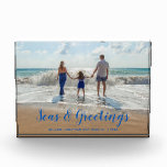 Blue Seas and Greetings Beach Christmas Photo Block<br><div class="desc">A clever take on holiday wishes with this keepsake gift  featuring your favourite beach photo with Seas & Greetings in a modern tropical blue text . Personalise with your family name and the year.</div>