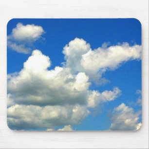 Blue skies white fluffy clouds mouse pad