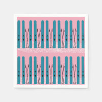 Blue skis on snow & pink background