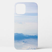 Blue sky and mountains view from airplane stylized