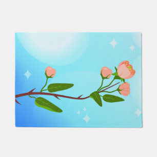 Blue sky gradient with blooming spring branch doormat