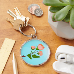 Blue sky gradient with blooming spring branch key ring