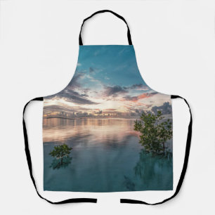 blue sky with red and dark clouds reflected on sea apron
