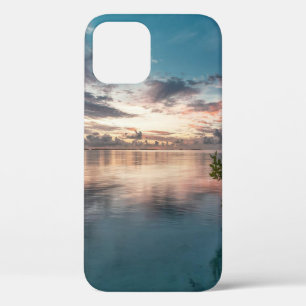 blue sky with red and dark clouds reflected on sea iPhone 12 case