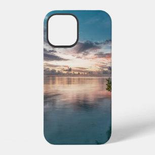 blue sky with red and dark clouds reflected on sea iPhone 12 case