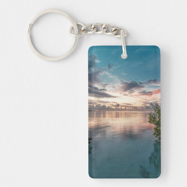 blue sky with red and dark clouds reflected on sea key ring (Front)