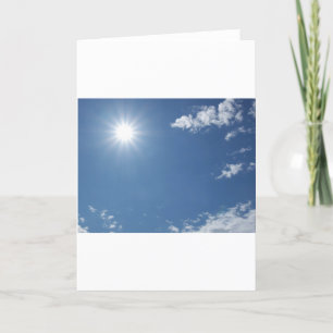 Blue sky with white clouds useful as a background card