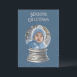 Blue Snow Globe Photo Flat Holiday Card<br><div class="desc">Send your seasonal greetings in style with this fully customisable holiday card featuring a whimsical snow globe design. The card showcases your personal photo in the snow globe, allowing you to capture a special moment with family, pets, or favourite holiday decor. The background is a festive blue with a sprinkle...</div>