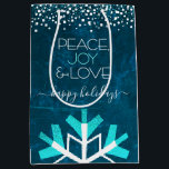 Blue Snowflake Modern Peace Joy Love Typography Medium Gift Bag<br><div class="desc">“Peace, joy & love.” A giant, fun, playful, white and turquoise snowflake illustration and modern typography on a rich, deep teal blue marble watercolor background help you usher in the holiday season. A white and turquoise confetti dot border frames the top. Feel the warmth and joy of the holidays whenever...</div>