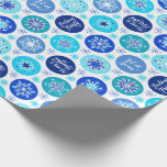 Blue Snowflakes Wrapping Paper<br><div class="desc">This snowflakes wrapping paper has a beautiful blue Snowflakes holiday pattern. This pattern has three sayings “Merry & Bright”, "Let it Snow" and “Feeling Frosty” in pretty scrolling script font. There are 11 different snowflakes with 6 colours of blue. You can make the pattern on the wrapping paper smaller or...</div>