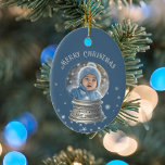 Blue Snowglobe Snowflake Photo Ceramic Ornament<br><div class="desc">Adorn your Christmas tree in style with this fully customisable ornament featuring a whimsical snow globe design. The ornament showcases your personal photo in the snow globe, allowing you to capture special memories with family, pets, or friends. The background is a festive blue with a sprinkle of adorable snowflakes, creating...</div>