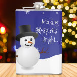 Blue Snowman Winter Scene Christmas Flask<br><div class="desc">Enjoy your favourite adult beverage with this festive Blue Snowman Winter Scene Christmas Flask. Flask design features a happy snowman in a snowy wintry scene against a royal blue background adorned with matching colour snowflakes and the saying "Making Spirits Bright" which you can leave or personalise with your own saying....</div>