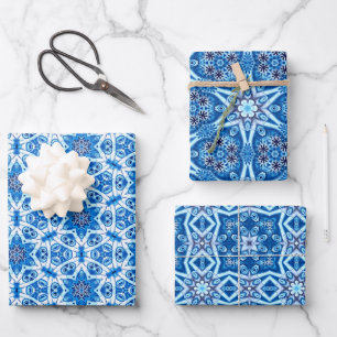 Blue snowy, wintry floral and star pattern wrapping paper sheet
