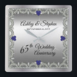 Blue Spinel | Diamonds 65th Wedding Anniversary Square Wall Clock<br><div class="desc">Opulent elegance frames this 65th wedding anniversary design in a unique scalloped diamond design with heart-shaped blue spinel and diamond accents and faux added sparkles on a silver-tone gradient. Please note that all embellishments are printed and are only made to appear as real as possible in a flat, printed design....</div>