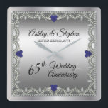 Blue Spinel | Diamonds 65th Wedding Anniversary Square Wall Clock<br><div class="desc">Opulent elegance frames this 65th wedding anniversary design in a unique scalloped diamond design with heart-shaped blue spinel and diamond accents and faux added sparkles on a silver-tone gradient. Please note that all embellishments are printed and are only made to appear as real as possible in a flat, printed design....</div>