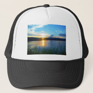 Blue sunset on lake trucker hat