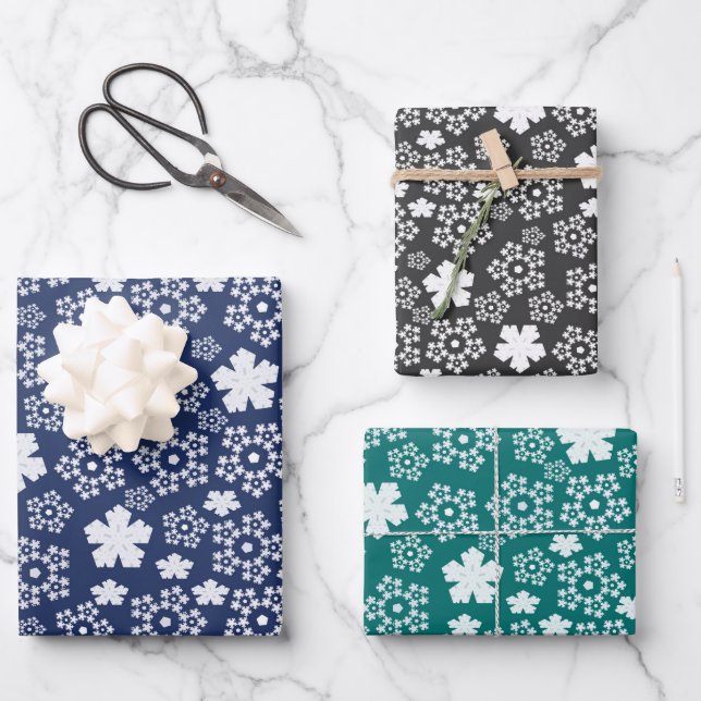 Blue, Teal, Black & White Star & Snowflake Pattern Wrapping Paper Sheet (Front)