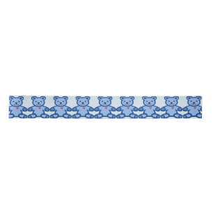 Blue teddy bear with heart satin ribbon