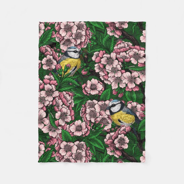 Blue tit birds in the blooming cherry tree on gree fleece blanket (Front)