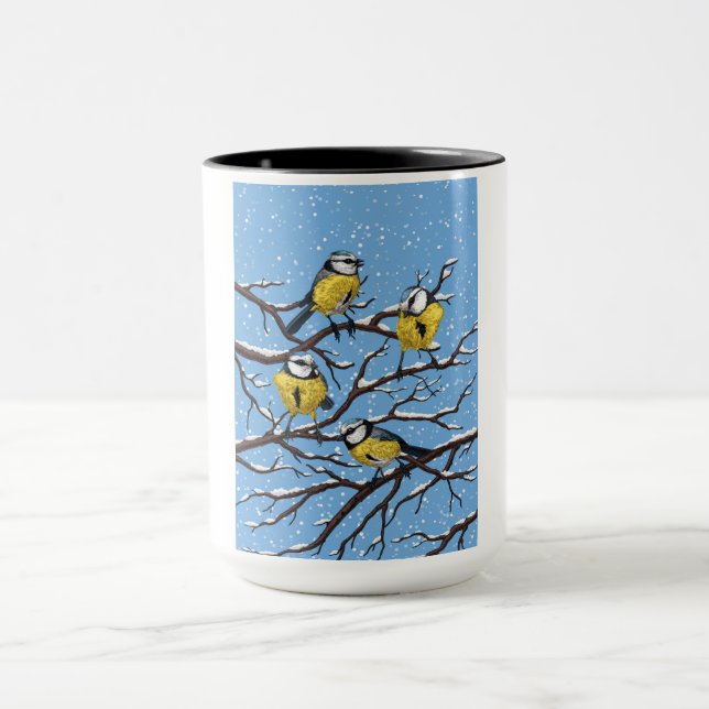 Blue tit birds in winter mug (Center)