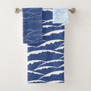 Blue towel set with illustrative waves pattern